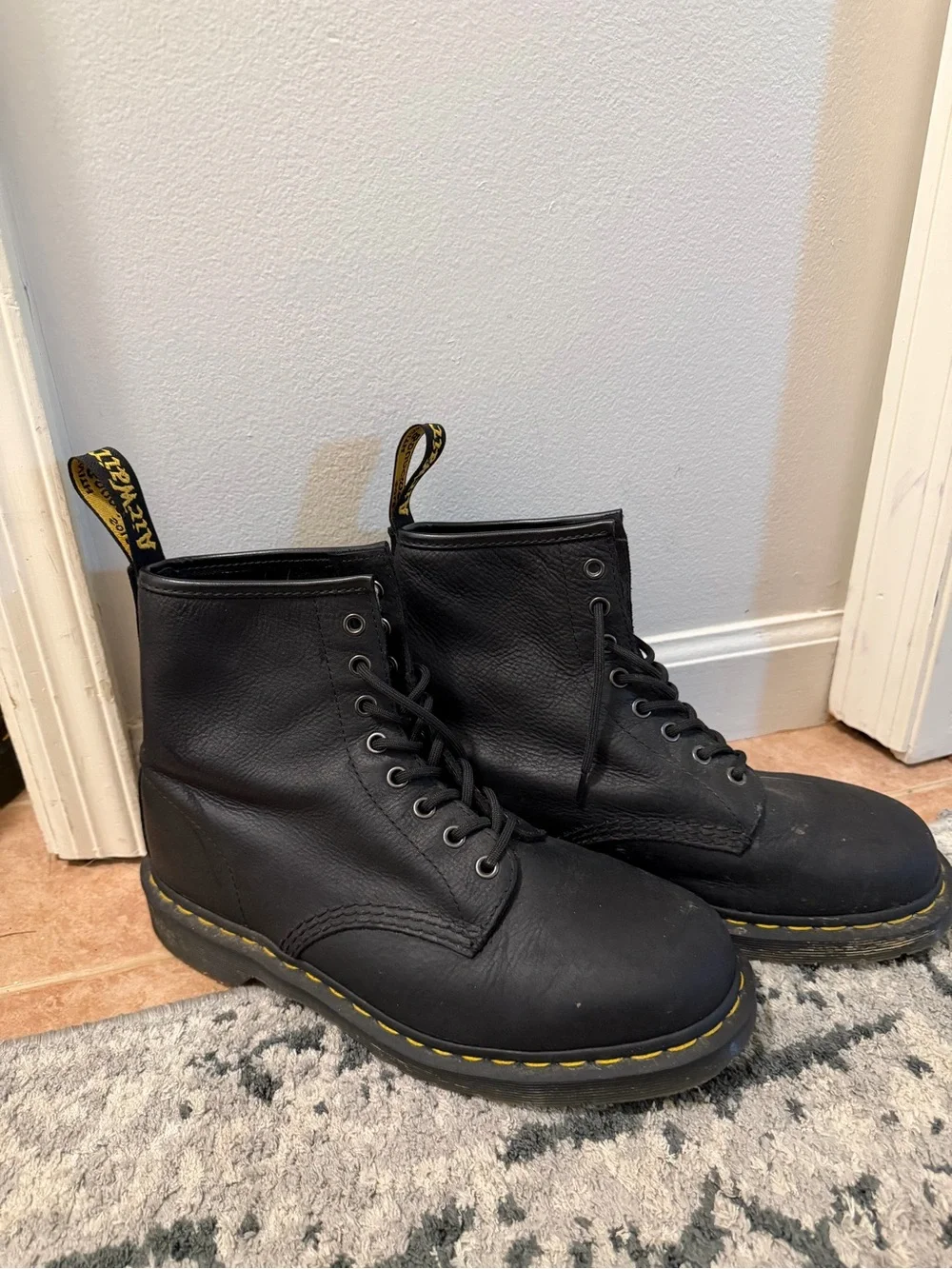 Dr. Martens Black Leather 8-Eye Lace-Up Boots with Yellow Stitching